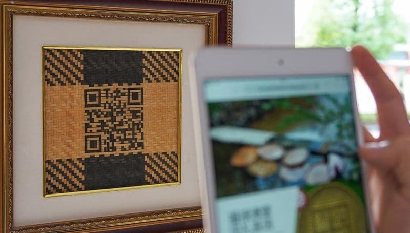 Bamboo QR code for the online torch relay of the Asian Games was woven by a master from Huzhou