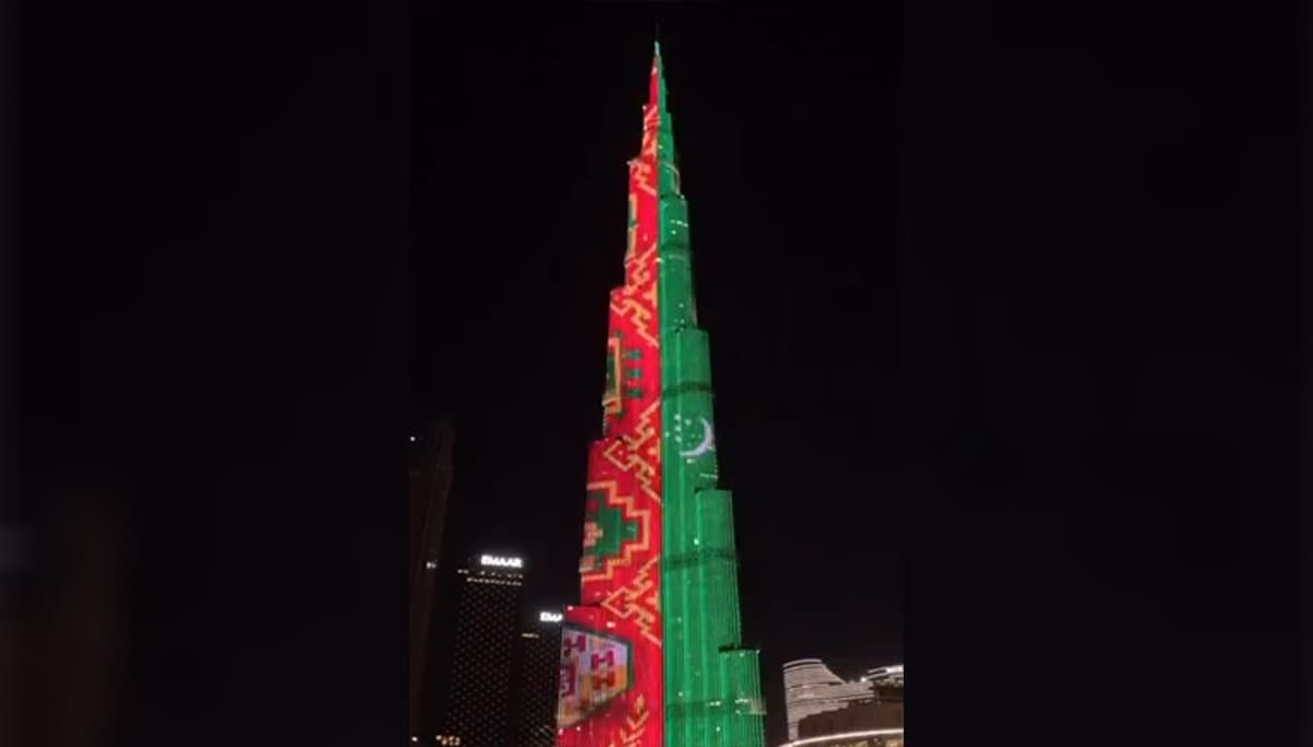 The tallest building in the world illustrated in the colors of the Turkmen flag